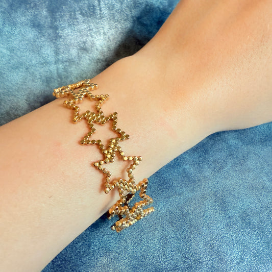 604 “ESTRELLAS” Brazalete dorado