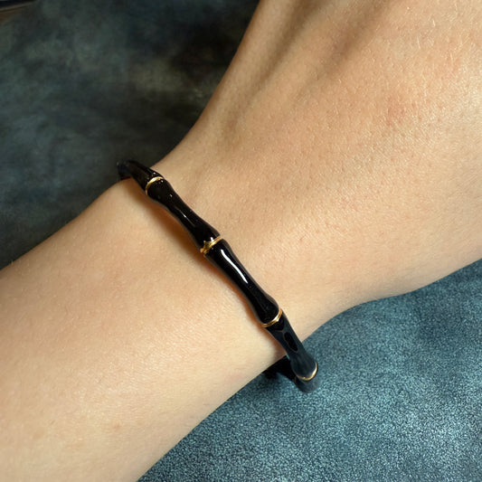 611 “HUESOS” Brazalete negro