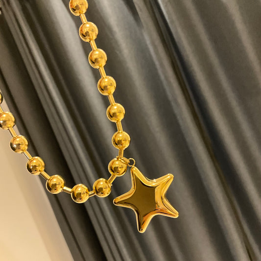 "COSMICA" Collar dorado